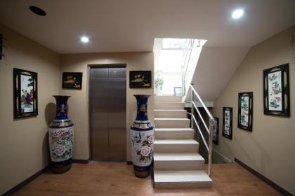 OYO 432 Longzhu Guesthouse - image 3